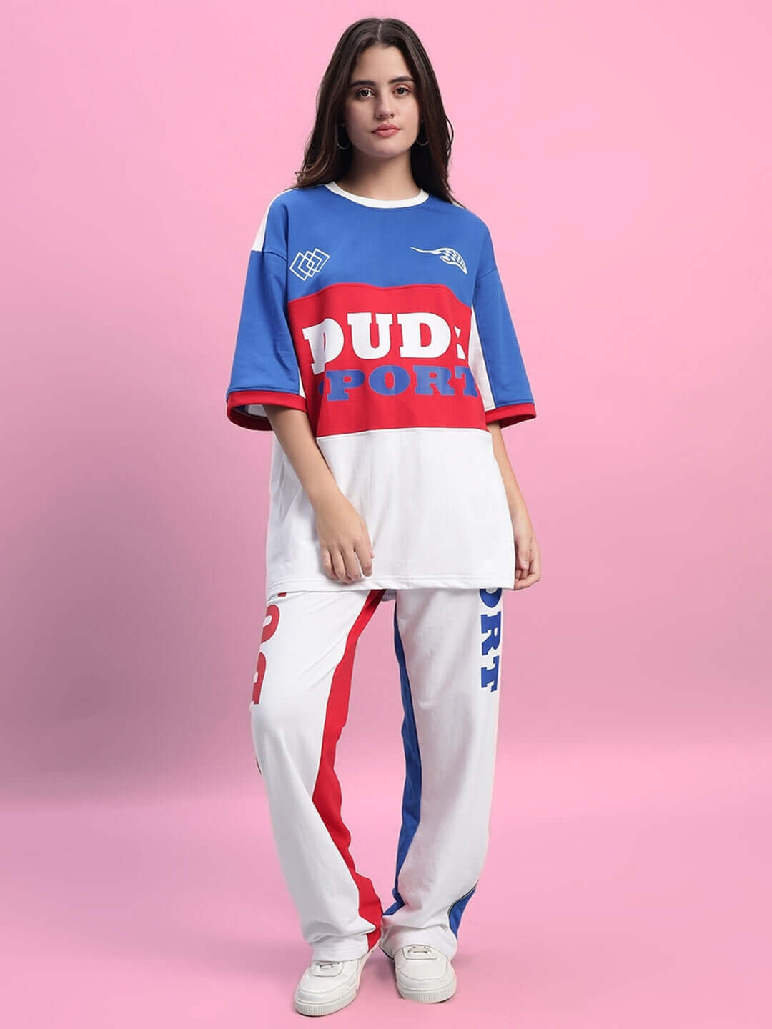 Model wearing WOMEN'S URBAN DRIFT CO-ORD SET MULTI in bold colors, featuring an oversized top and matching pants for stylish everyday wear.