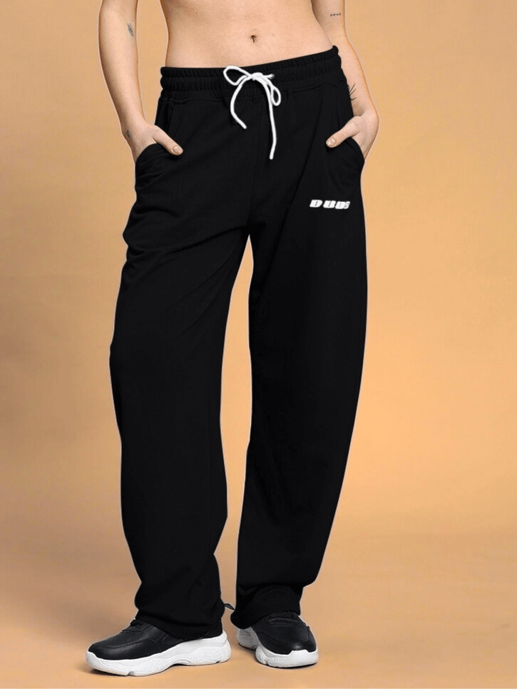 Women's vanilla relaxed-fit joggers in black color with drawstring waist, made-to-order by DUDS.