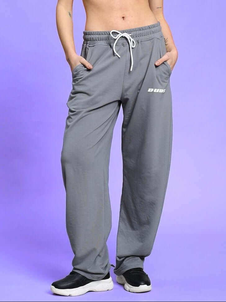 Model wearing women's grey vanilla relaxed-fit joggers from DUDS, showcasing comfortable and stylish casual wear for women.