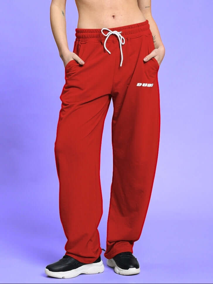 Women's red relaxed-fit joggers from DUDS, featuring a drawstring waistband and casual design, offering customizable fit options.