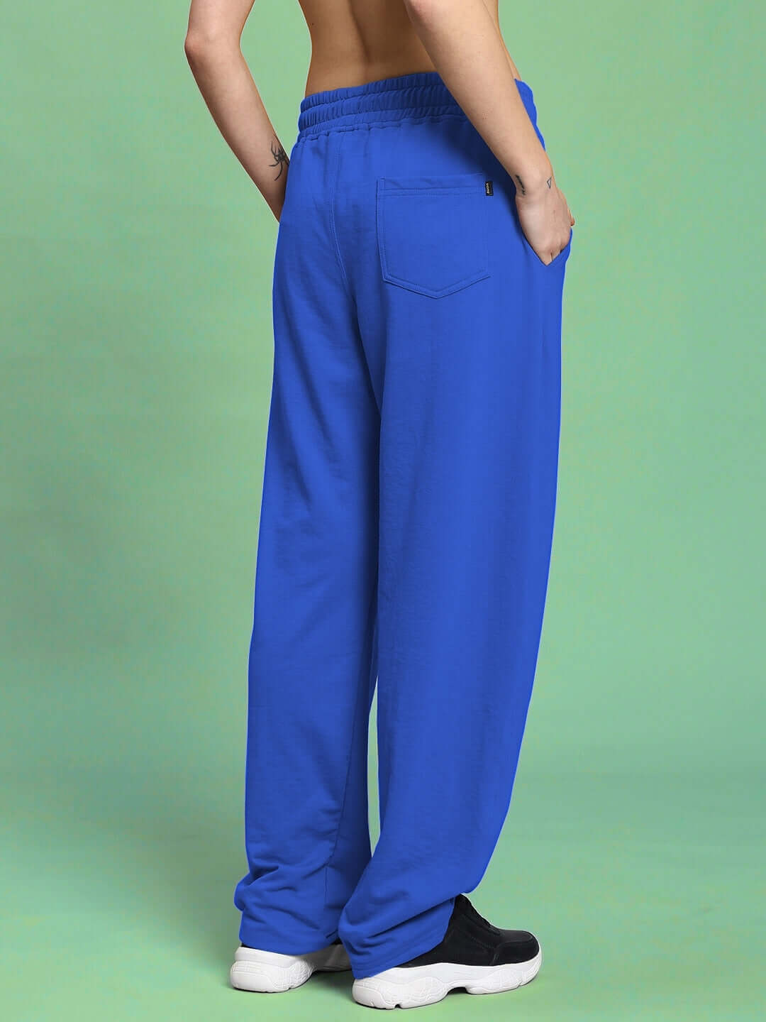 Back view of Women's Vanilla Relaxed-Fit Joggers in royal blue, showcasing elastic waist and pocket detail.