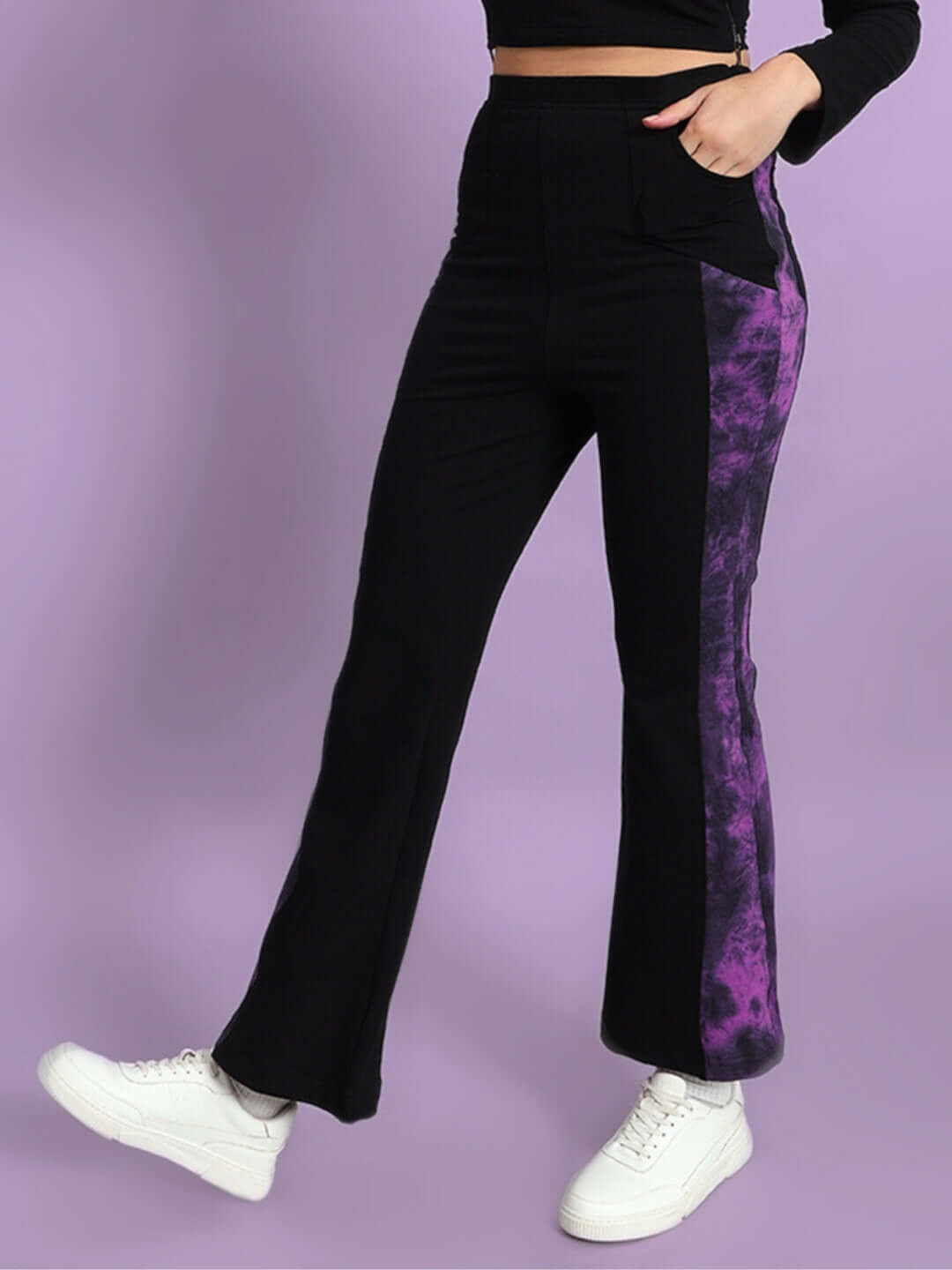 Black and purple tie dye boot cut pants for women, featuring a stylish panel design and made-to-order customization options.