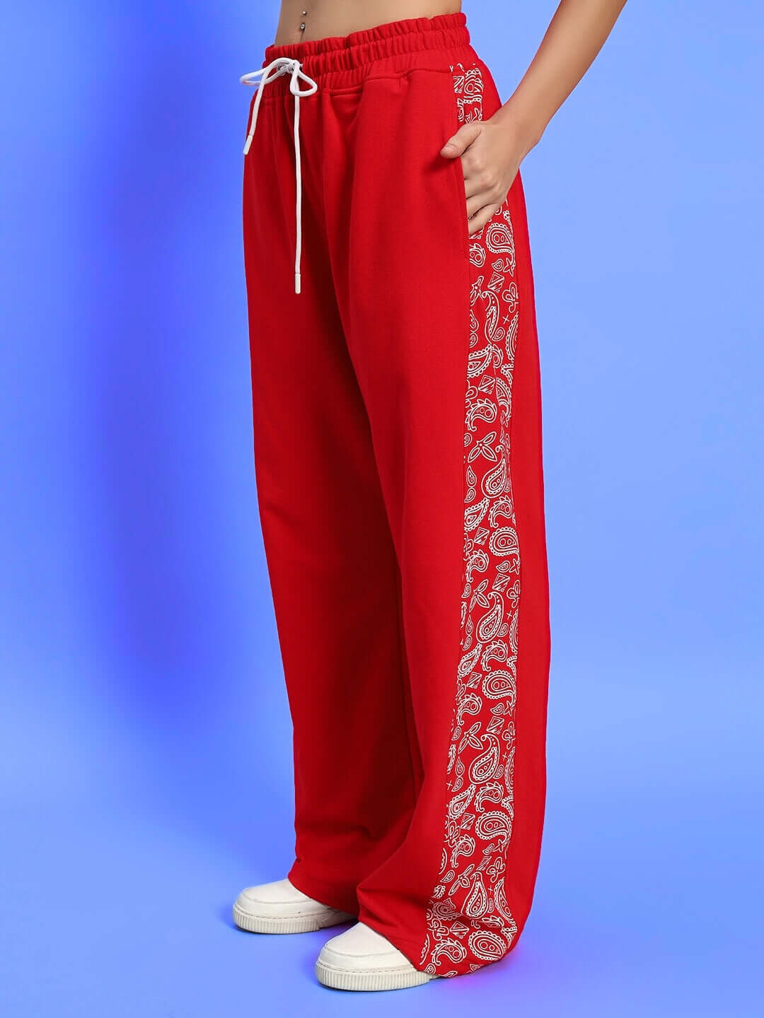 Women's red relaxed fit joggers with paisley design and drawstring waist, made to order, customizable for perfect fit.