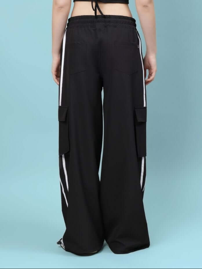 Rear view of women's black relaxed fit cargo pants with multiple pockets by DUDS, ideal for a custom fit option.