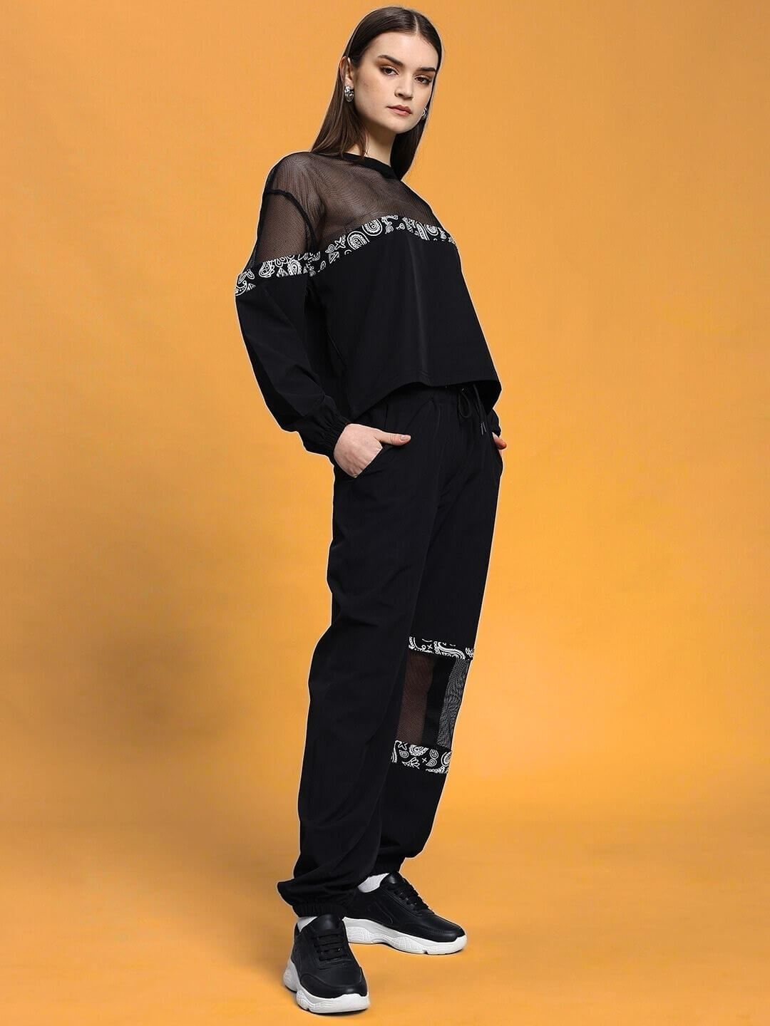 Women's Yesmin relaxed fit black co-ord set featuring unisex design, elasticated waistband with drawstring, polyester fabric.