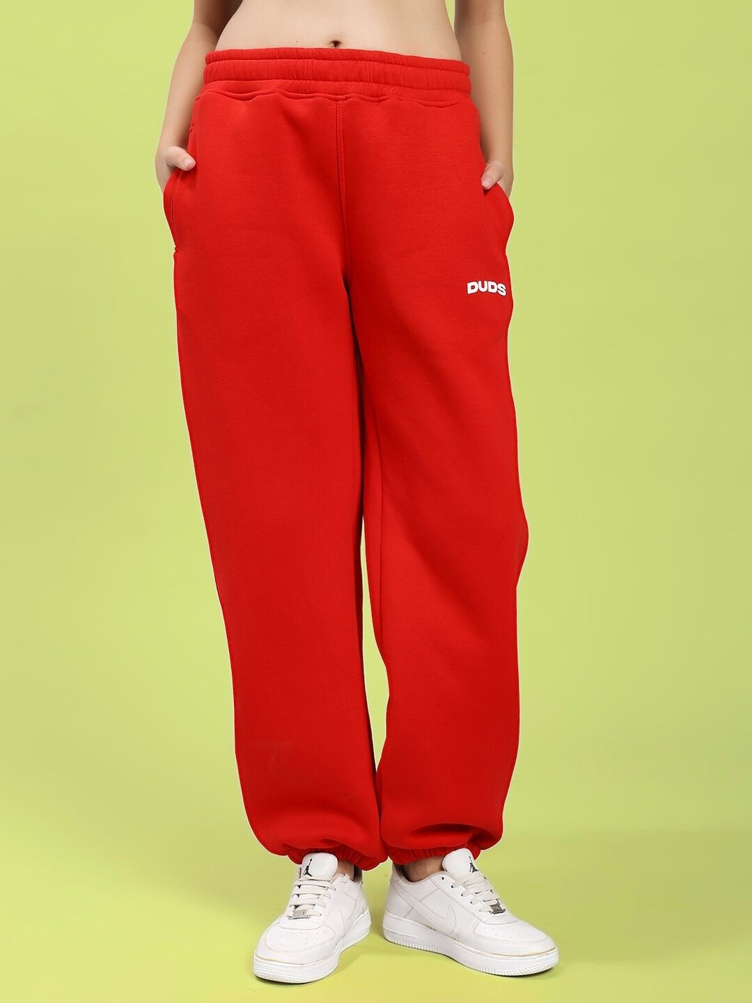 WOMEN'S ZENO RELAXED FIT FLEECE JOGGER RED, featuring a cozy relaxed fit and bold street style.