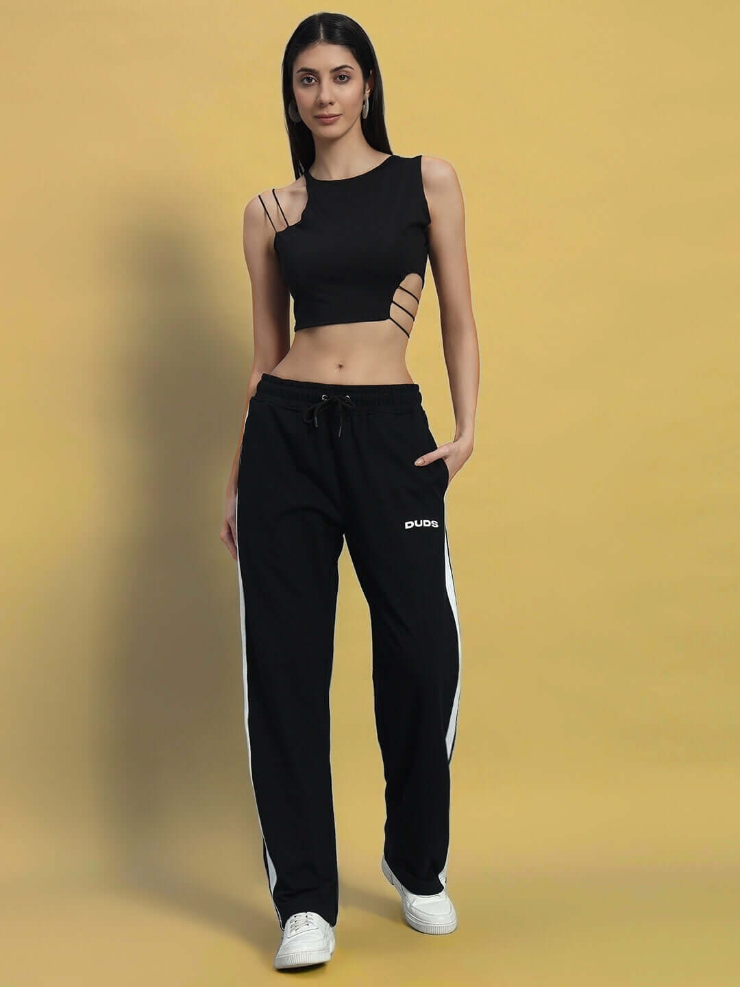 Model wearing Women's Avalon Slit Zipper Joggers in Black-White with custom fit option from DUDS.