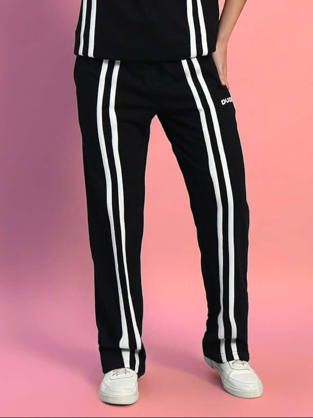 Women's black joggers with two white stripes, tailored by DUDS; customizable fit and made to order.