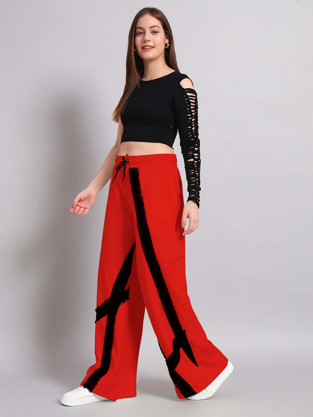 Women's frayed textured stripes co-ord set in black and red, featuring relaxed fit joggers with elasticated waistband.
