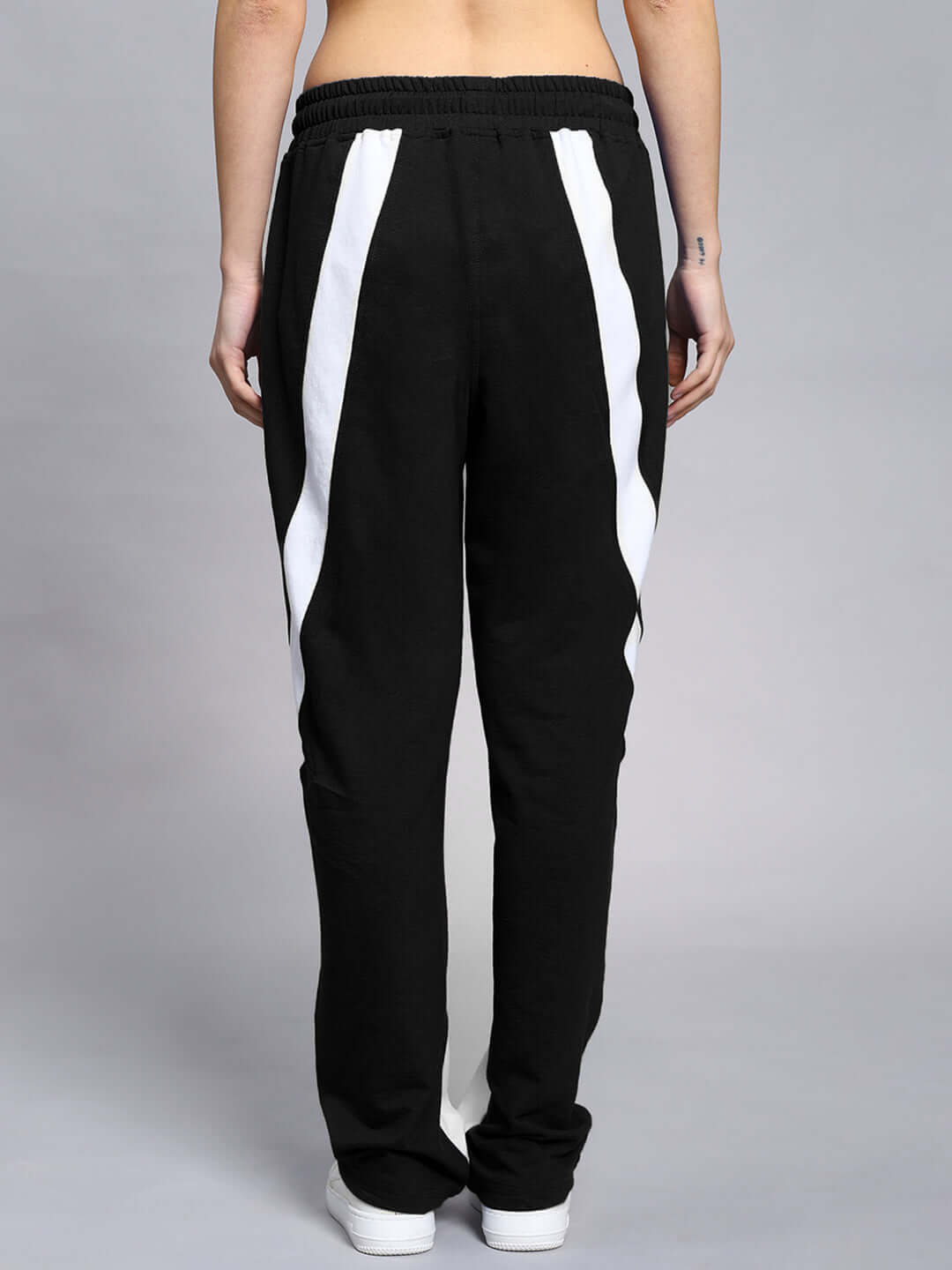 Back view of Women's Celestine Cool Relaxed Fit Jogger in Black-White, showcasing comfortable and stylish design by DUDS.