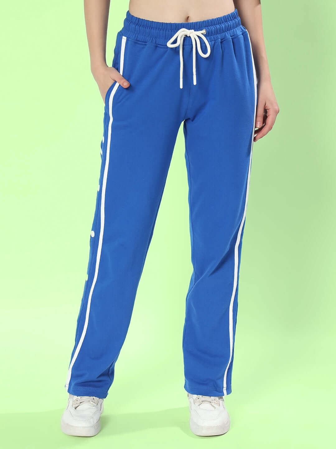 Women's blue contrast panel joggers with white side stripes and drawstring, perfect for custom fit. Made to order at DUDS.