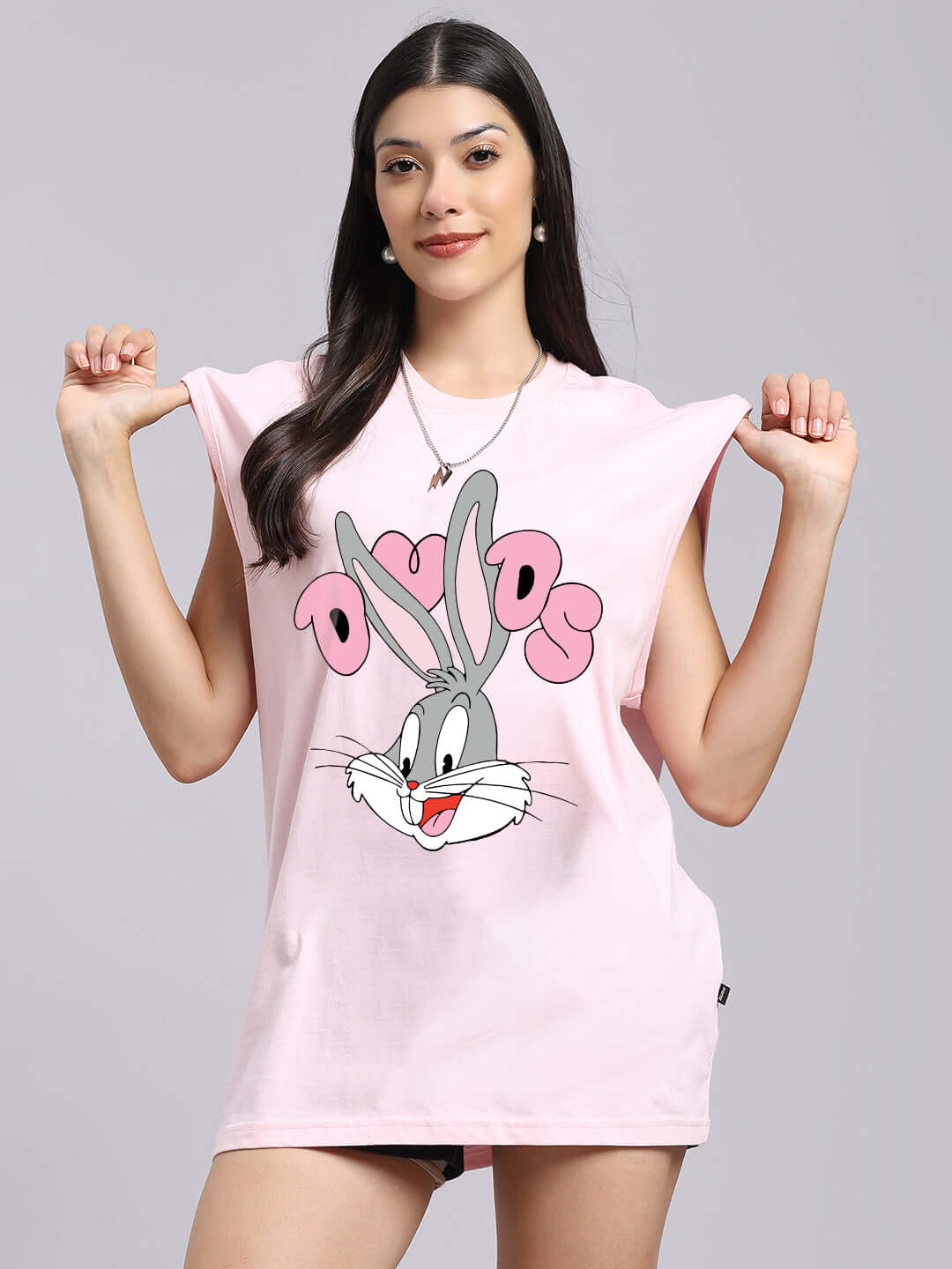 Woman wearing WOMENS COOL BUNNY PRINTED T-SHIRT PINK, featuring a fun bunny graphic, made of 100% cotton.