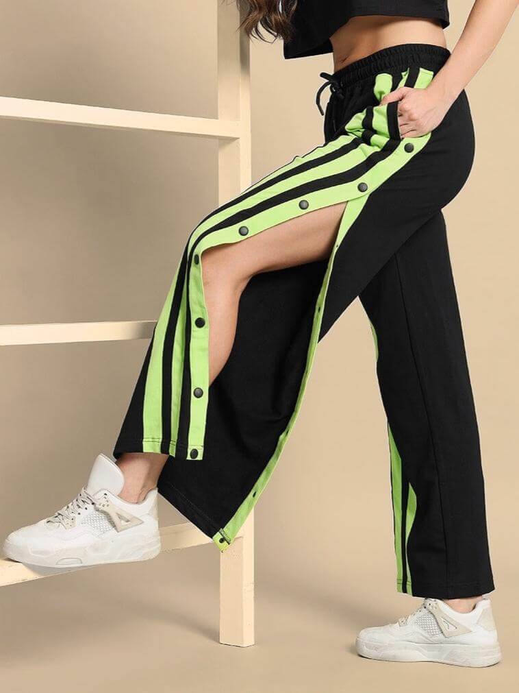 Women's Black-Neon Green Dancer Joggers showcasing side snap button design, perfect for style and comfort. Custom fit available.