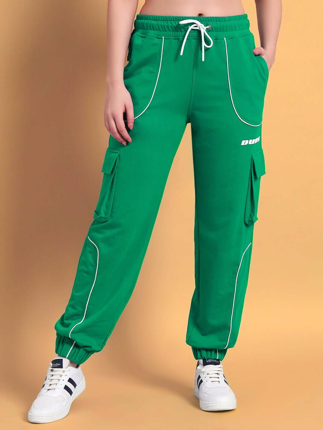 Women's green relaxed-fit joggers with cargo pockets, designed by DUDS, perfect for casual wear.