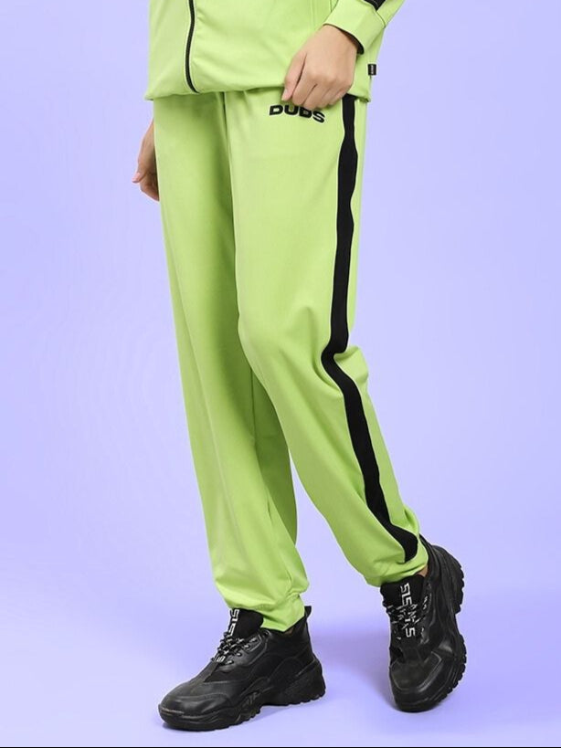 WOMEN'S HIGH PERFORMANCE RELAXED FIT JOGGER NEON GREEN showcasing modern activewear style on light purple background.