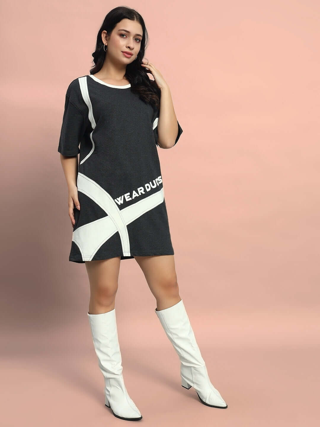 Model wearing Women's Jackson Dress in dark grey, premium heavy gauge cotton terry fabric, styled with white knee-high boots.