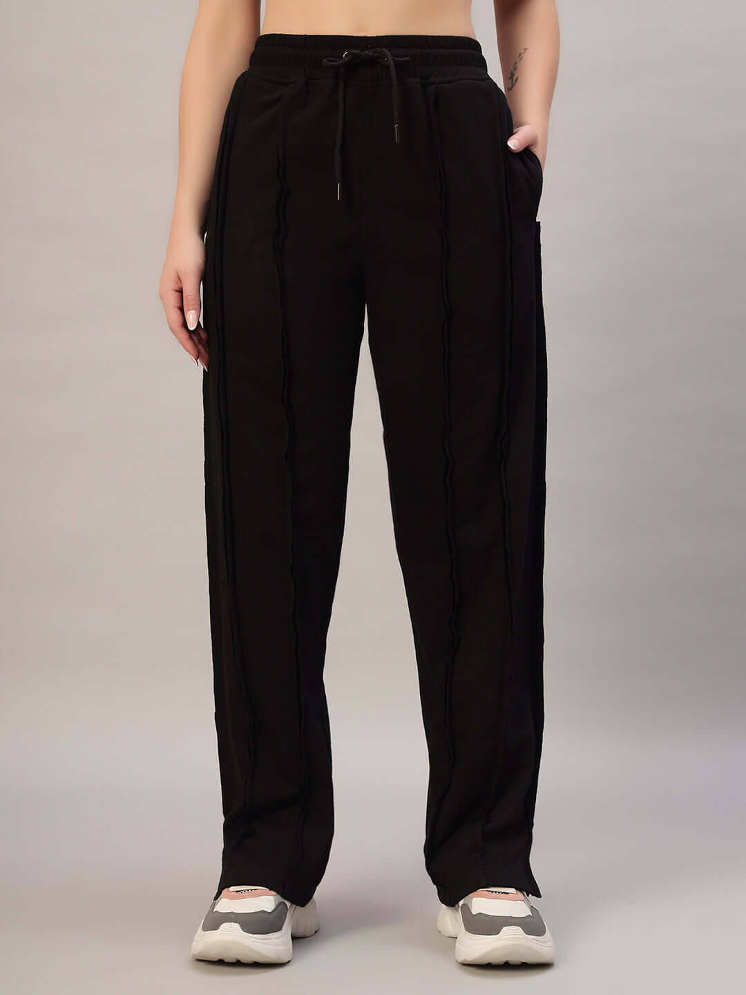 Women's Lamina side slit joggers in black, showcasing stylish design and comfortable fit.