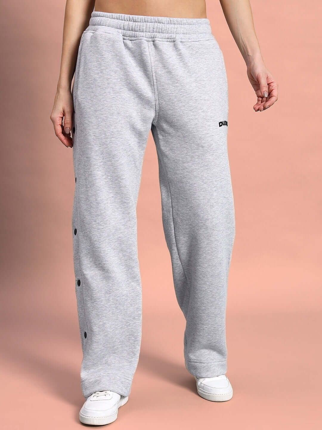 Women's grey polar fleece jogger by DUDS, featuring a casual fit with side button details, perfect for comfort and style.