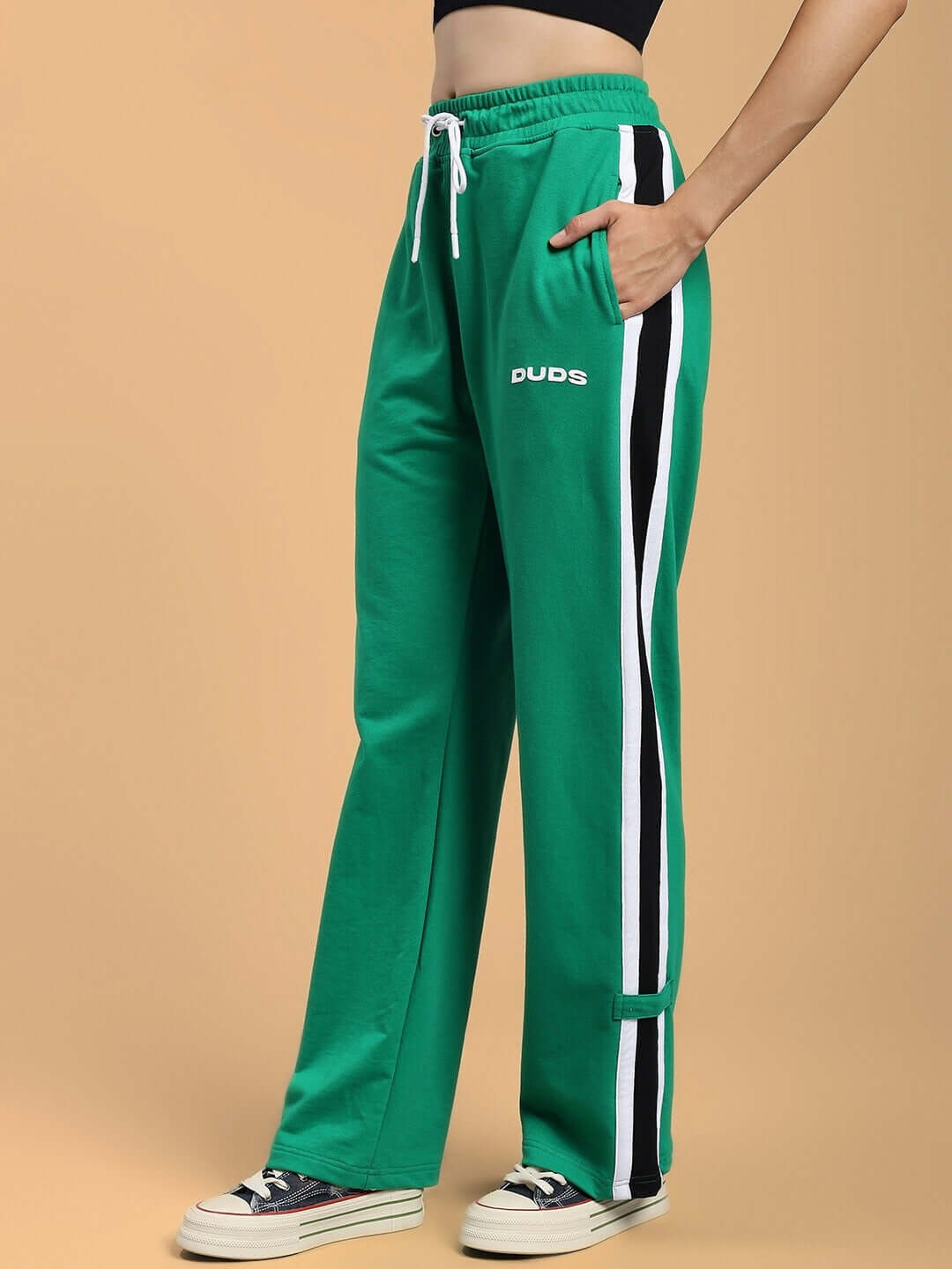 Model wearing Women's Rosston Green Joggers by DUDS, featuring relaxed fit and customizable options for a tailored experience.