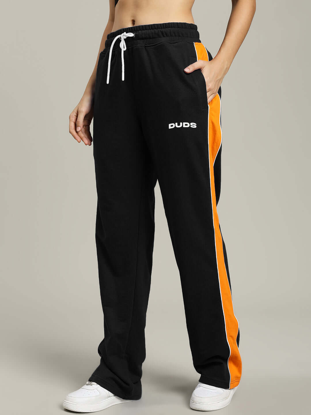 Women's Sanford Stripe Joggers in black with orange stripe and DUDS logo, customizable fit option available.
