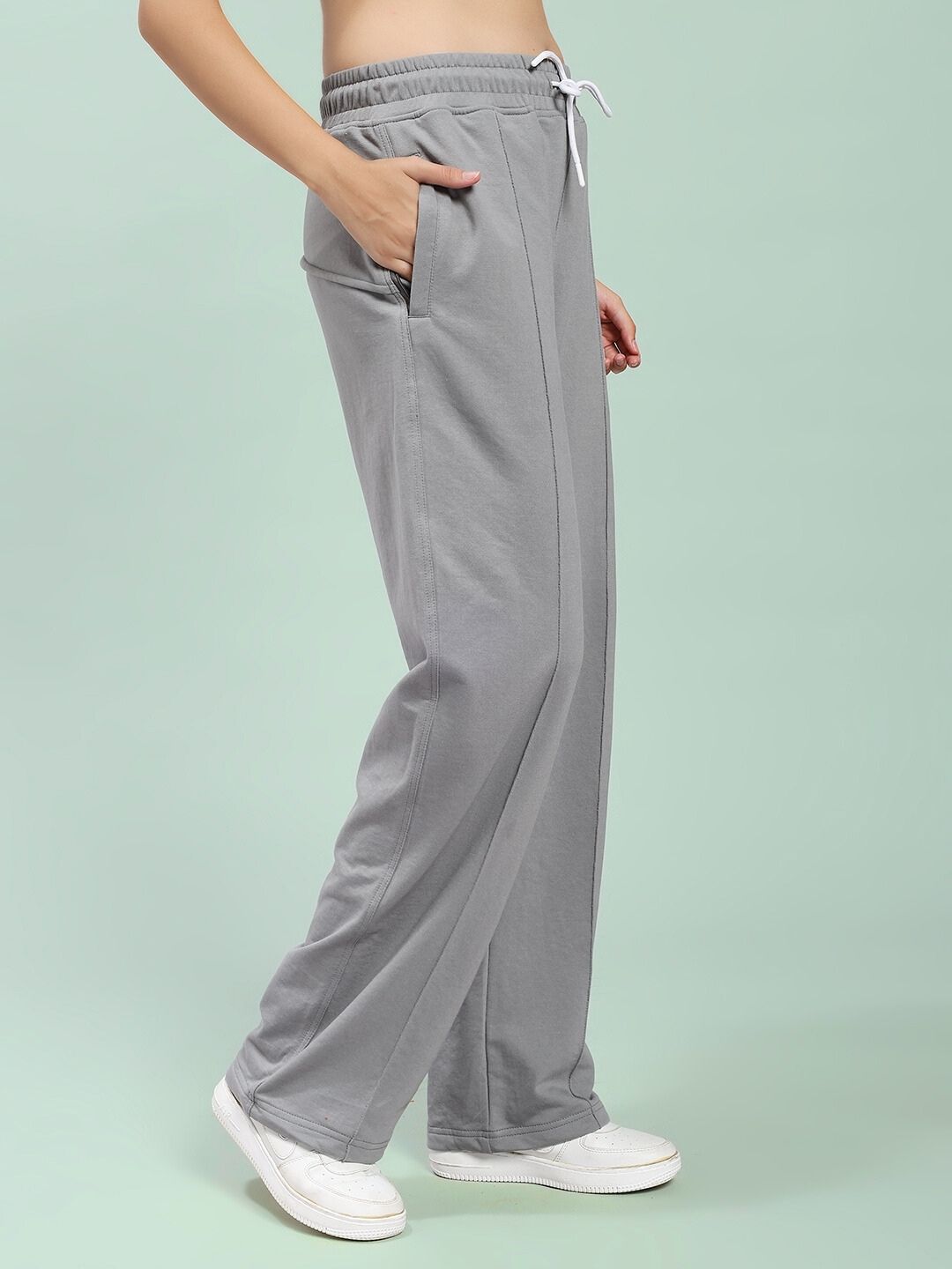 Side view of WOMEN SPIRAL RELAXED-FIT JOGGERS GREY, showcasing comfort and style in soft cotton-blend fabric.