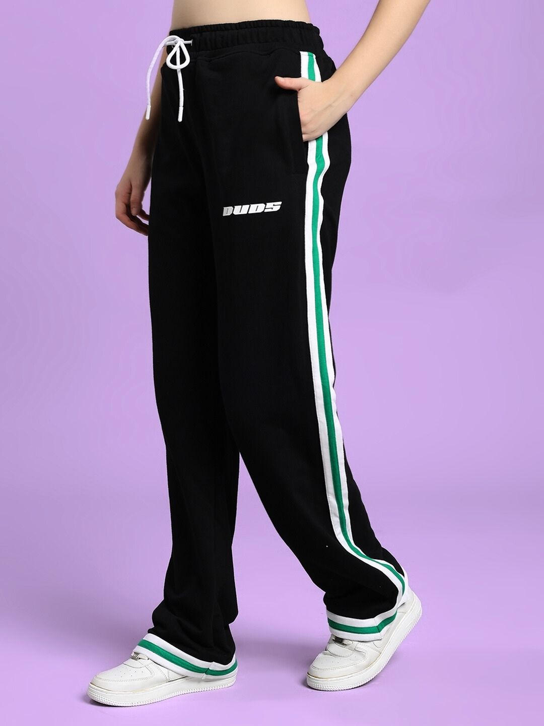 WOMEN'S VELO GREEN STRIPE RELAXED FIT JOGGER BLACK with bold green stripe and drawstring waistband, perfect for casual or sporty wear.