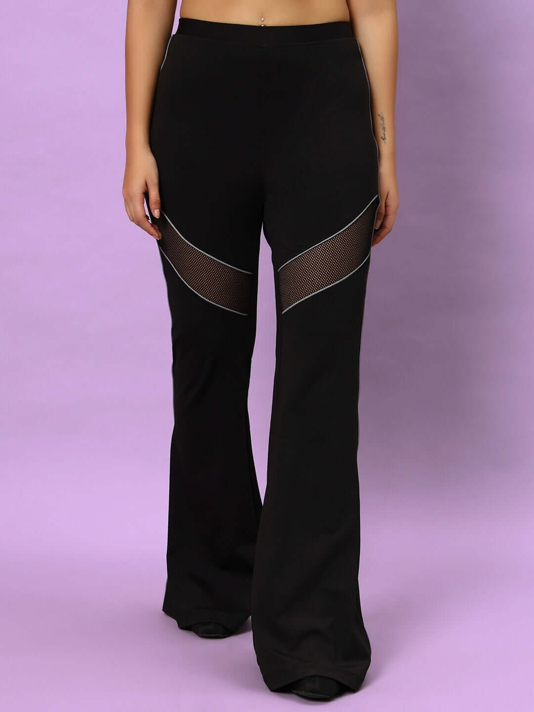 Women's black Victoria boot cut reflector pants featuring stylish mesh panels.