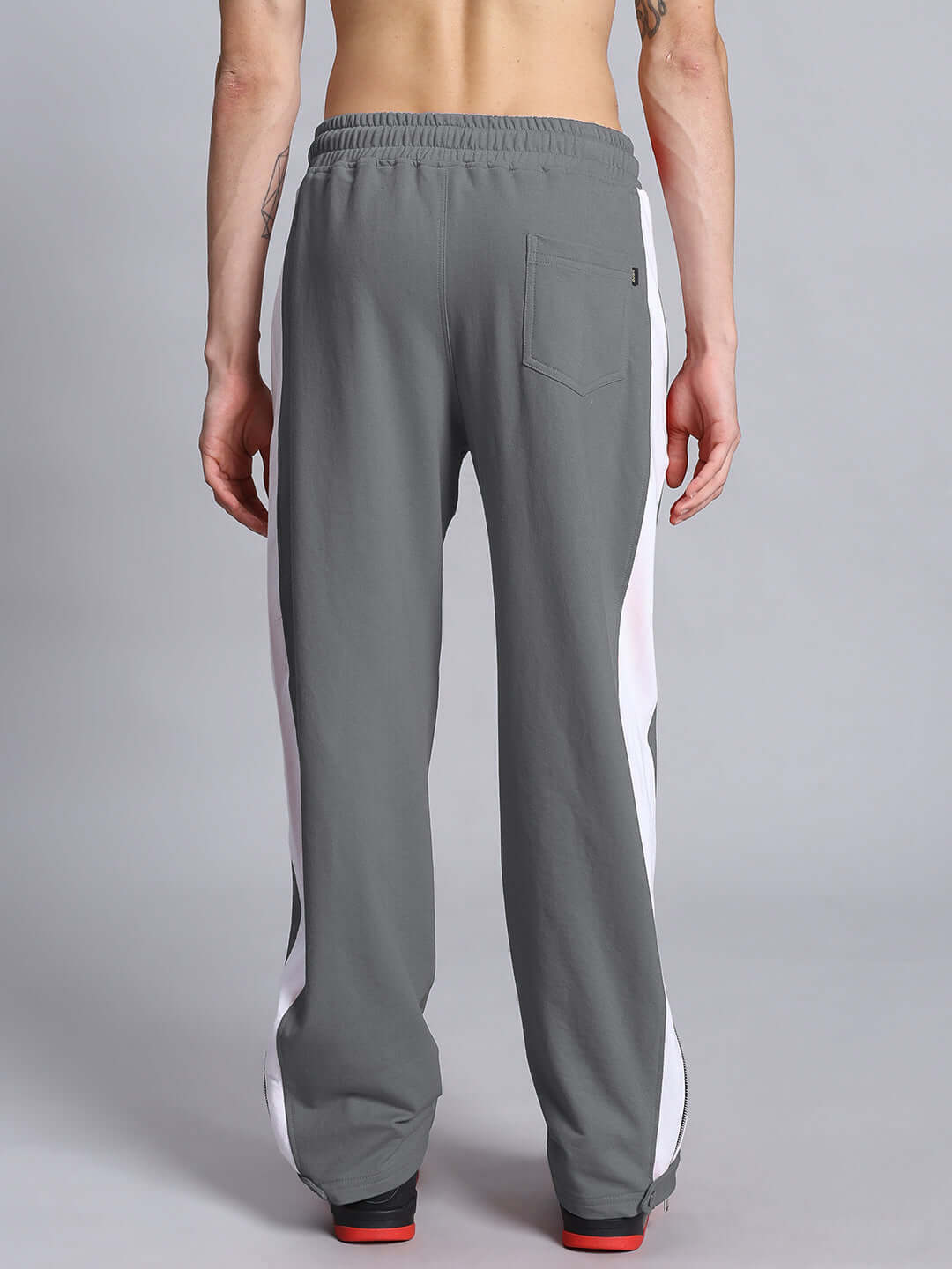 Back view of grey and white Wonder Slit Zipper Joggers showcasing back pocket and comfortable fit.