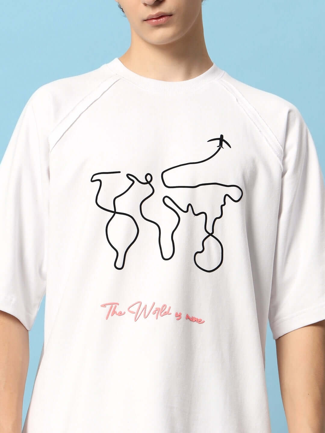 White co-ord set with abstract world map print and 'The World is Mine' text, made from premium cotton terry, bio-washed, India made.