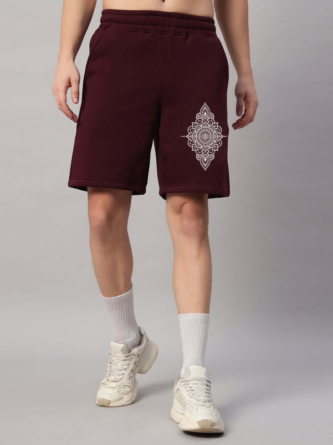 Person wearing WEARDUDS YANTRA FLEECE SHORTS WINE featuring a stylish design, customizable fit option for personalized sizing.
