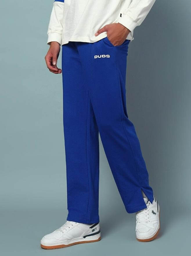 Royal blue Zion side slit joggers by DUDS, showcasing custom fit design for personalized comfort and style.