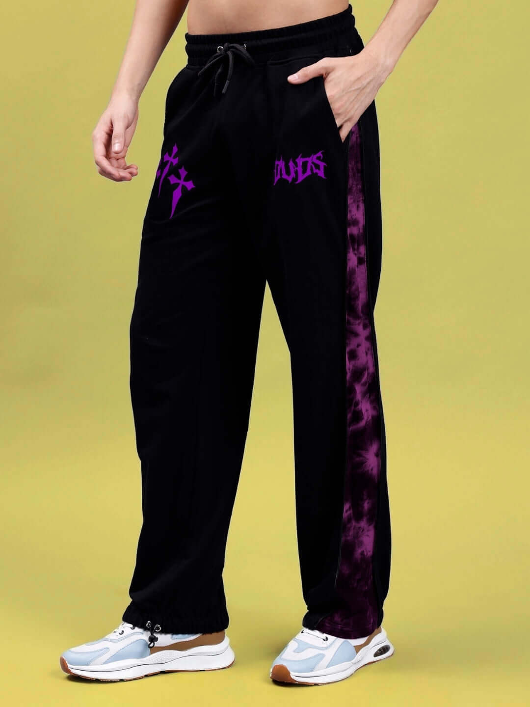 Person wearing Zipper Panel Joggers in purple with side stripes, featuring a comfortable style for everyday wear.