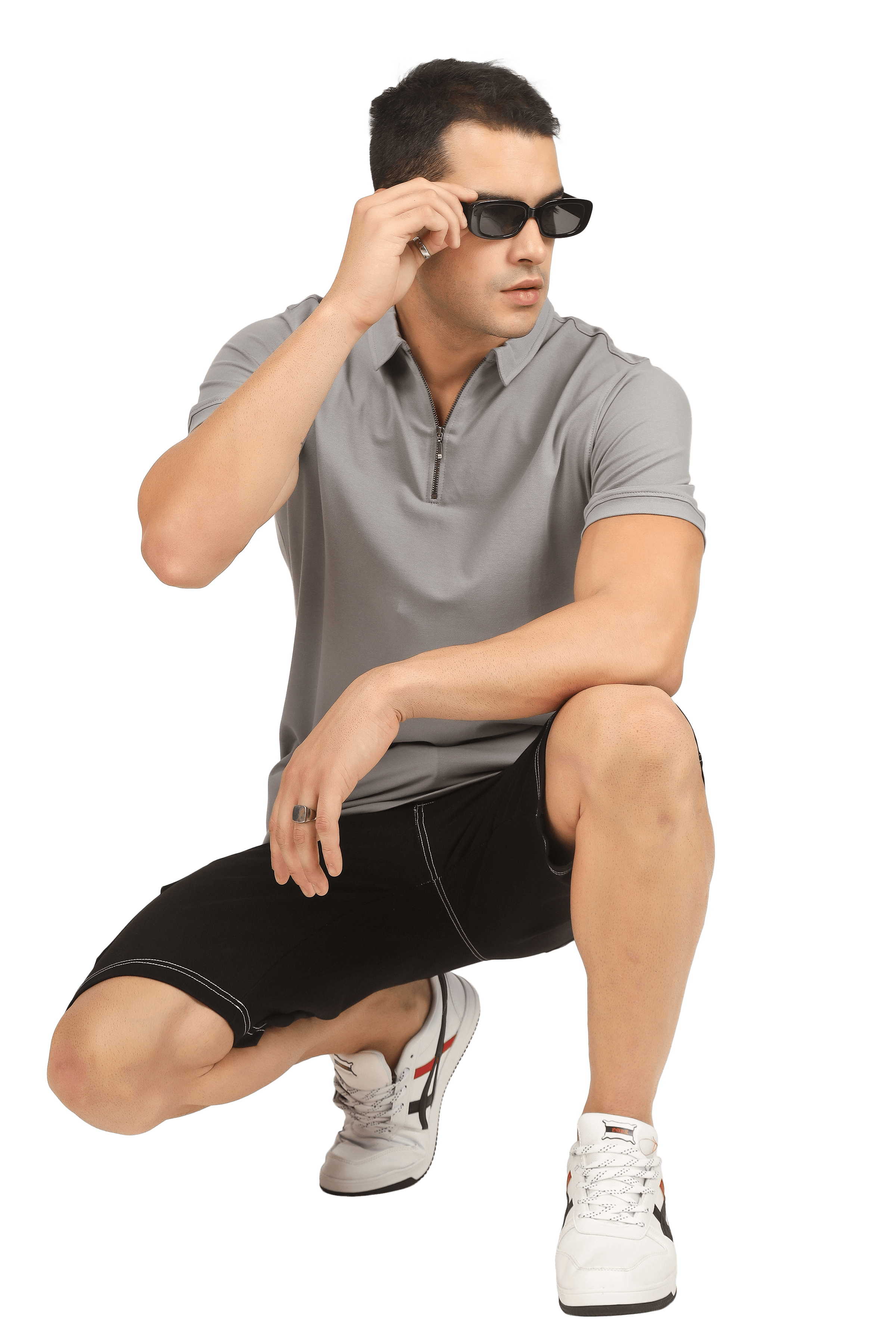 Model wearing a grained grey zipper polo neck t-shirt with half sleeves and slim fit, kneeling with sunglasses, showcasing comfort and style.