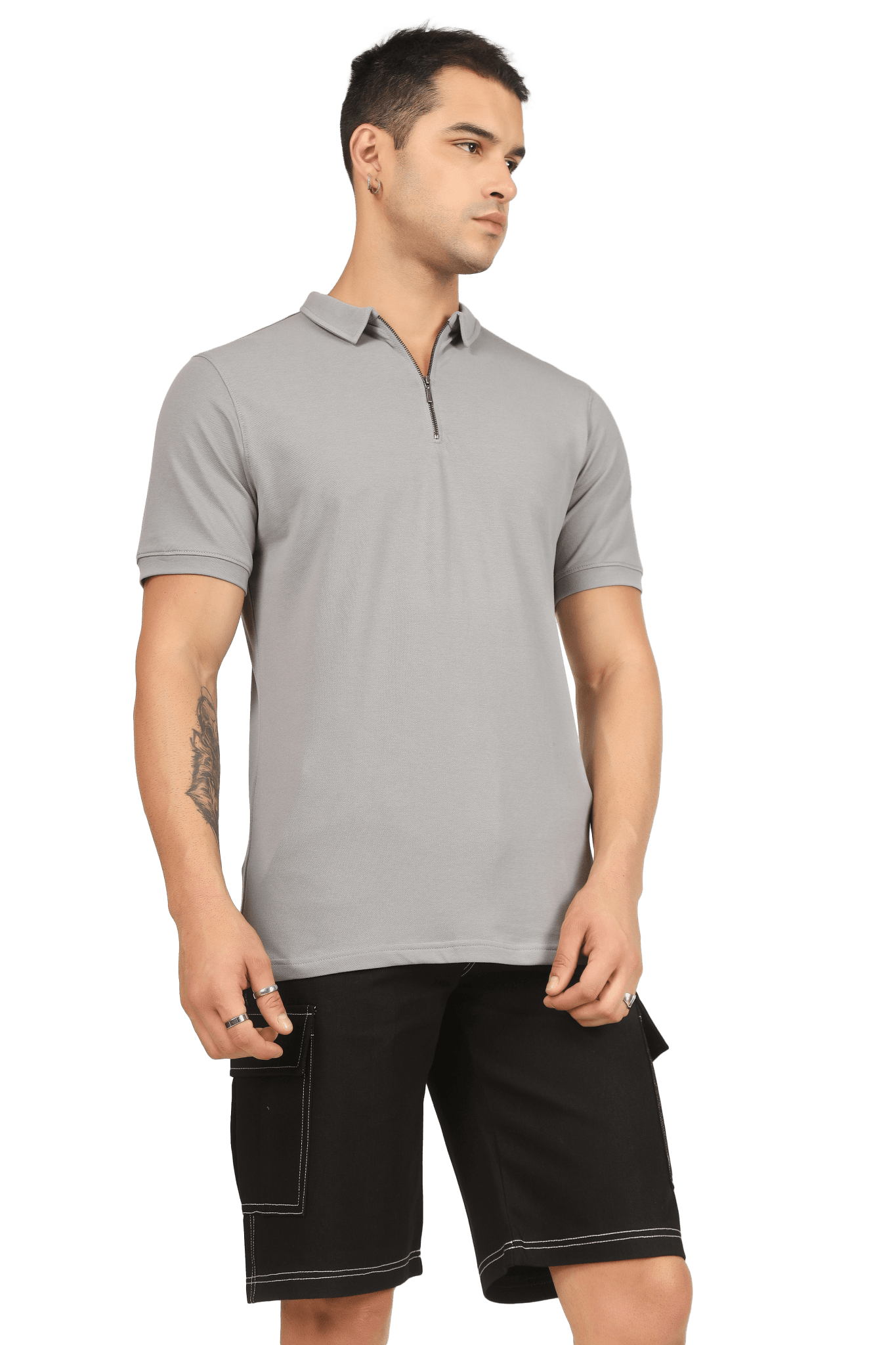 Man wearing ZIPPER POLO NECK T-SHIRT GRAINED GREY with black shorts, showcasing modern streetwear style and athletic-inspired look.
