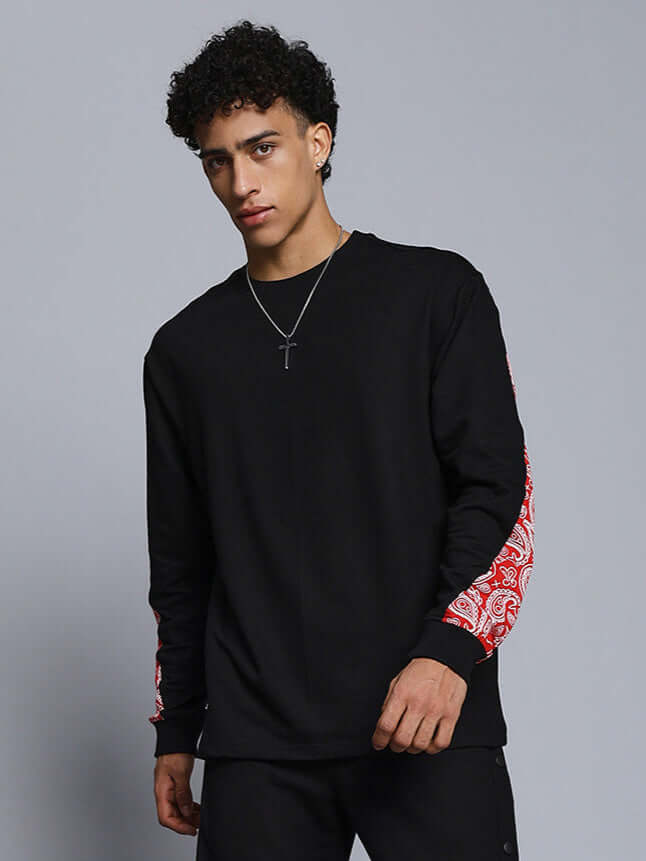 ZONEX black and red sweatshirt with premium cotton French terry fabric, featuring stylish red sleeve design, worn by a model.