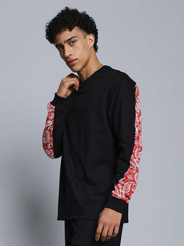 ZONEX black and red sweatshirt with premium cotton French terry fabric, featuring paisley patterned sleeves. Ideal for stylish cold weather wear.