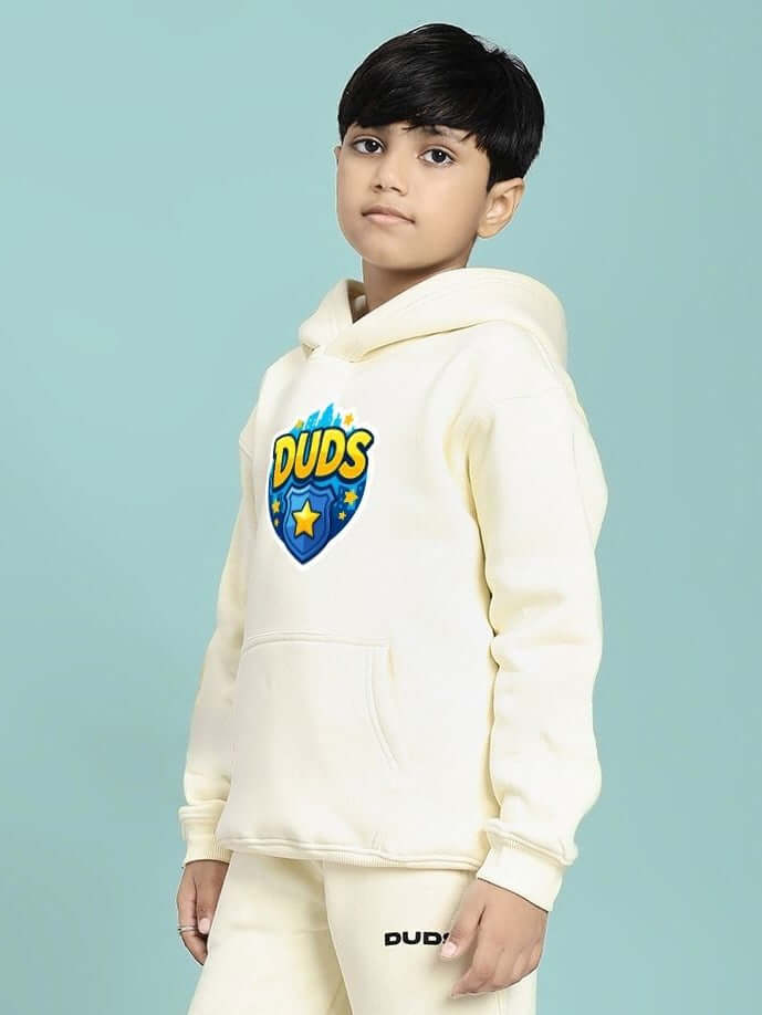 Child wearing ZOOTOPIA WORLD FLEECE HOODIE FOR BOYS AND GIRLS OFF WHITE, showcasing cozy and stylish design for kids.